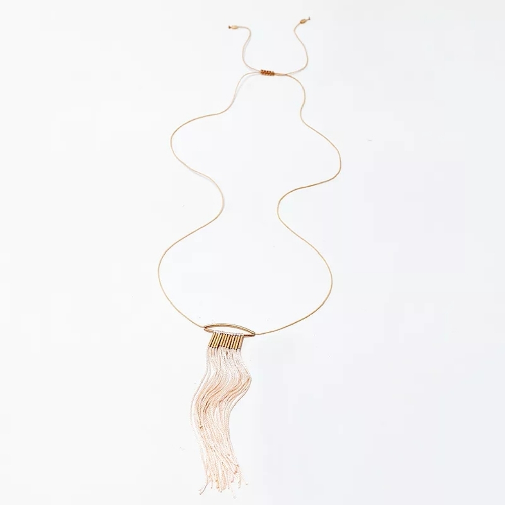 Beautiful boho new necklace. Cream and gold
